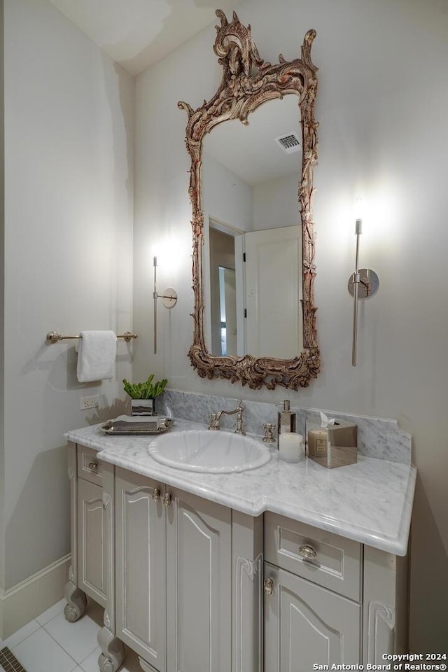 bathroom featuring vanity and tile patterned flooring