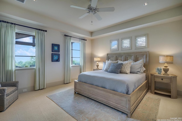 carpeted bedroom featuring ceiling fan