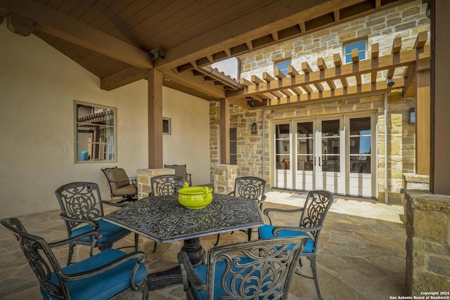 view of patio featuring french doors and a pergola