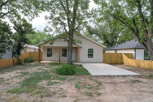 rear view of property with a patio area