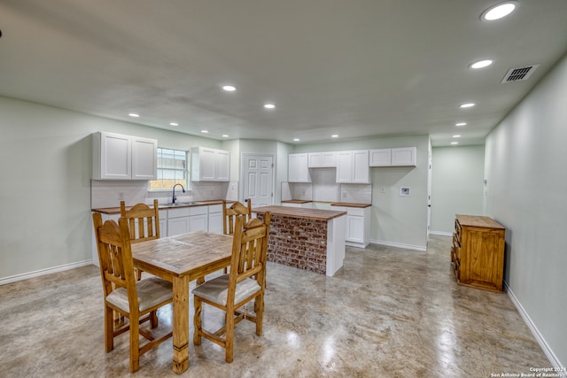 dining space featuring sink