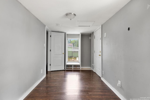 spare room featuring dark hardwood / wood-style floors