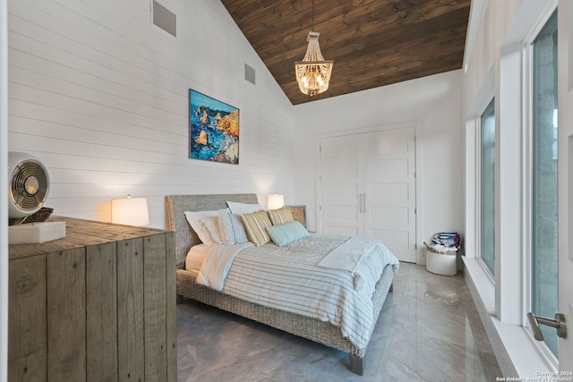 bedroom featuring a chandelier, a closet, high vaulted ceiling, and wood ceiling