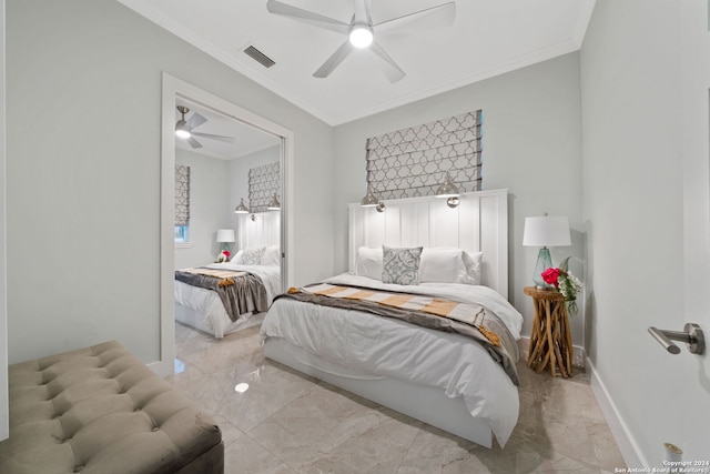 bedroom featuring ceiling fan and ornamental molding