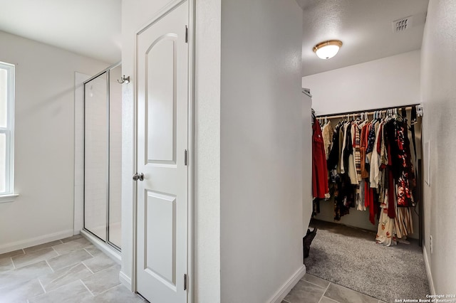 interior space with light tile patterned floors