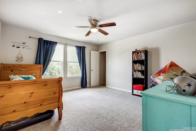 carpeted bedroom featuring ceiling fan