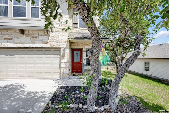 property entrance with a garage