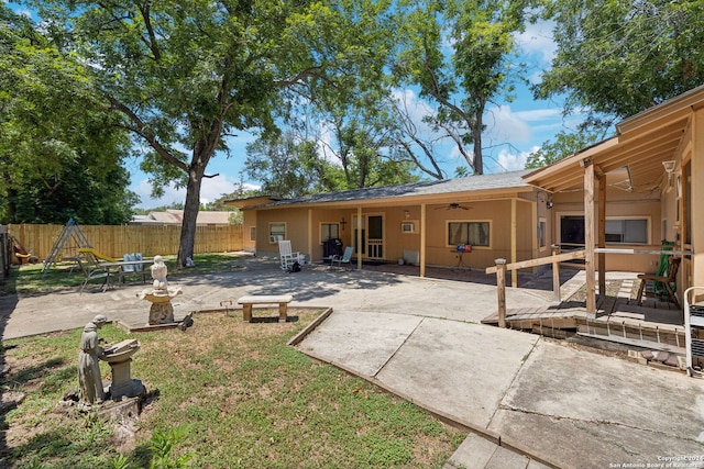 back of property with a patio area