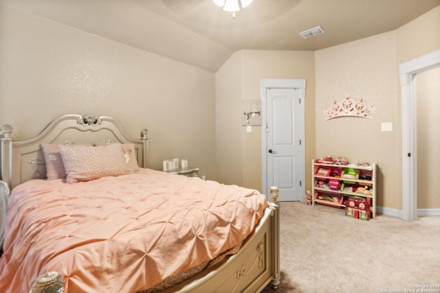 carpeted bedroom with ceiling fan and lofted ceiling