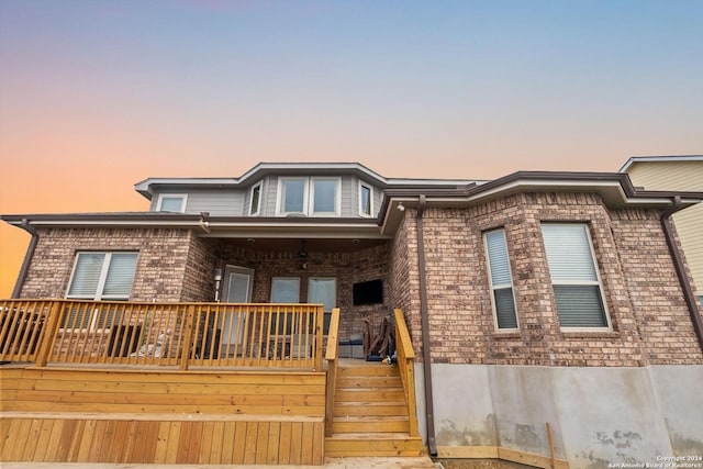 view of front of property with a deck