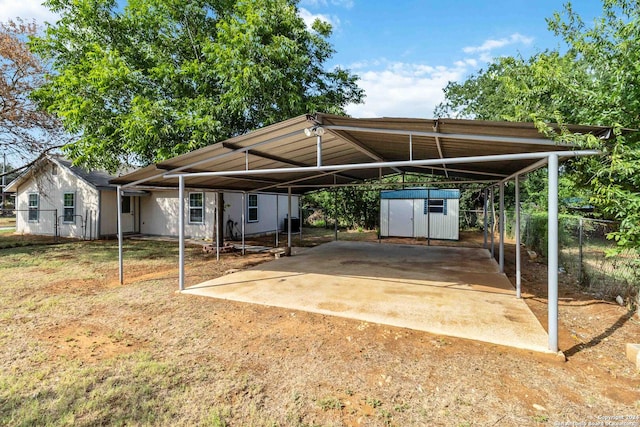 view of vehicle parking with a carport