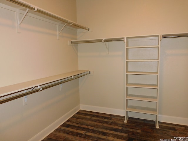 spacious closet featuring hardwood / wood-style floors