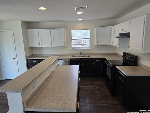 kitchen with sink, white cabinetry, black / electric stove, and a kitchen island