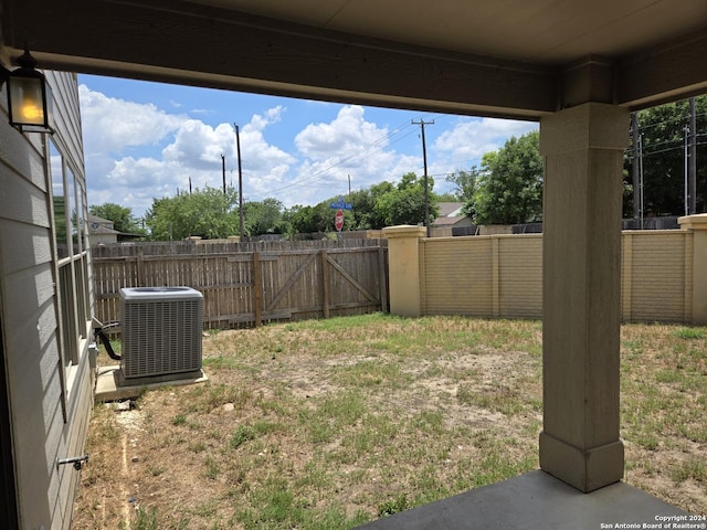 view of yard with central AC unit