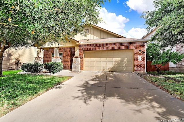 view of front of property featuring a garage