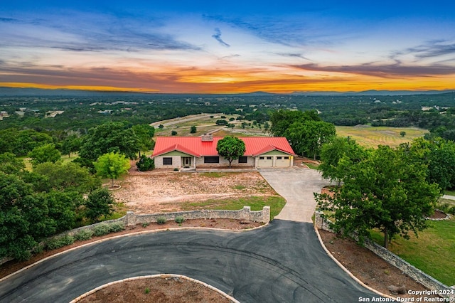 view of aerial view at dusk