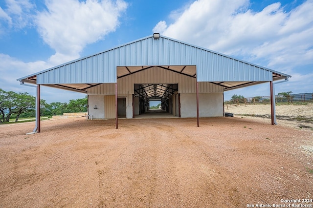 view of pole building featuring an exterior structure
