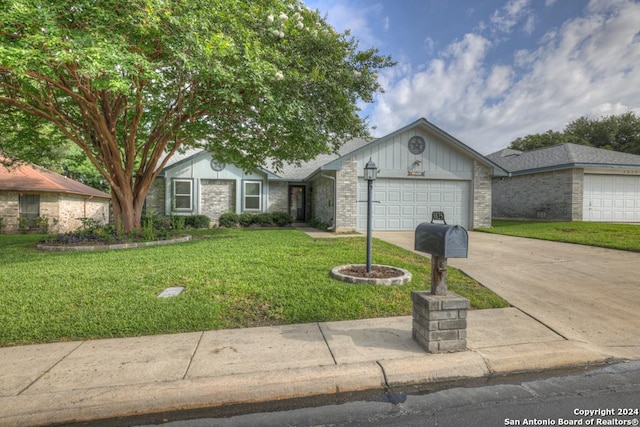 ranch-style house with a garage and a front lawn