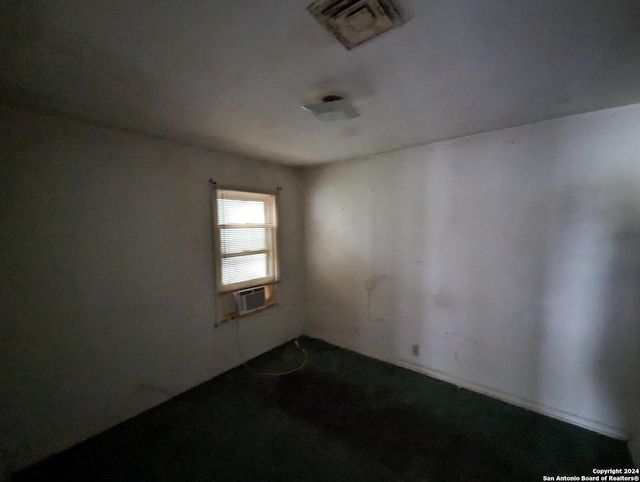 empty room with a wall mounted air conditioner