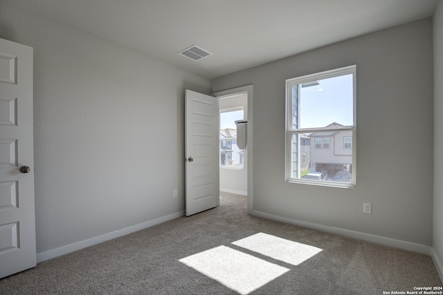 view of carpeted spare room