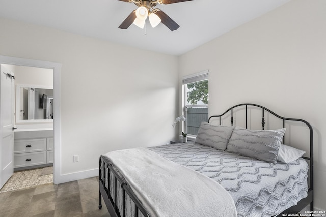 bedroom featuring ceiling fan and ensuite bathroom