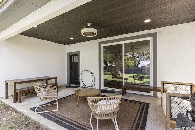 view of patio featuring ceiling fan