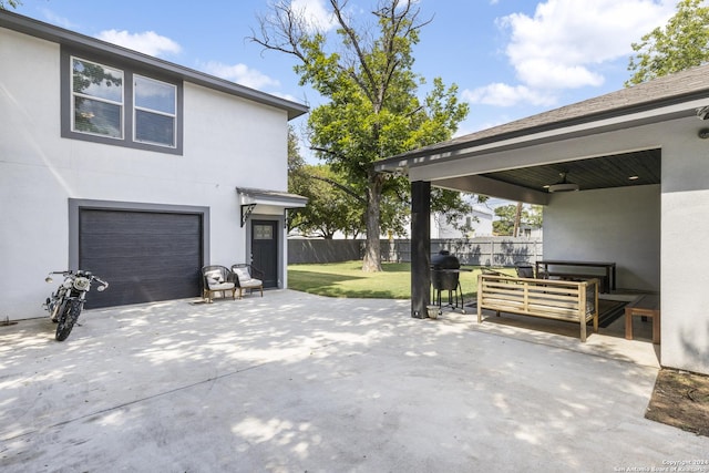 view of home's exterior with a yard and a patio