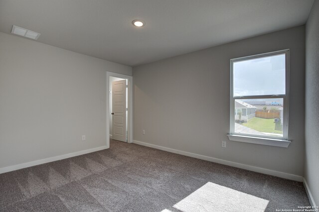 empty room featuring carpet