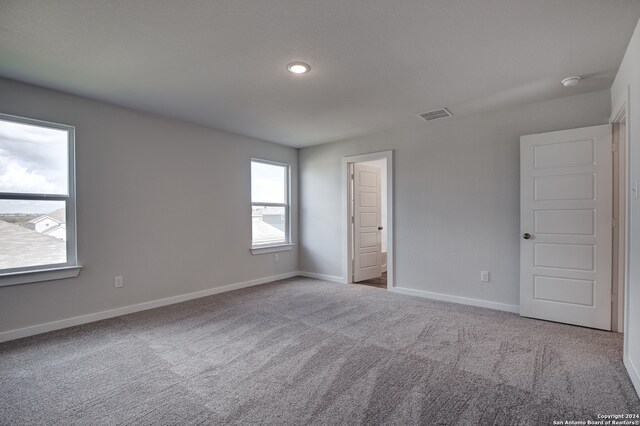 unfurnished bedroom featuring carpet floors