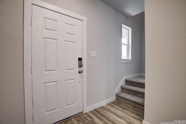 entryway with light hardwood / wood-style flooring