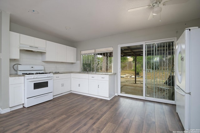 kitchen featuring white cabinetry, ceiling fan, dark wood-type flooring, tasteful backsplash, and white appliances