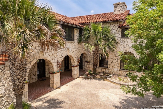 rear view of house featuring a patio area