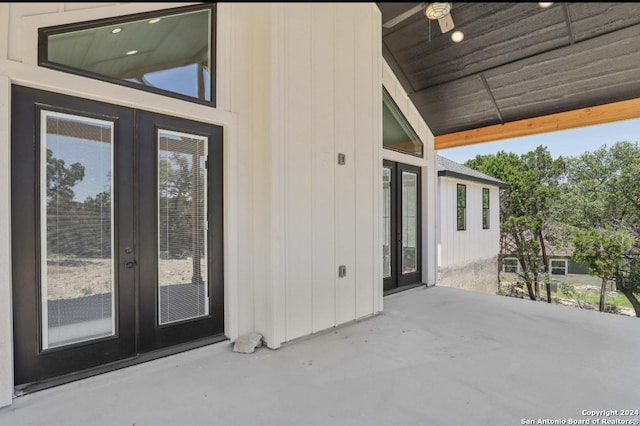 property entrance featuring french doors and a patio