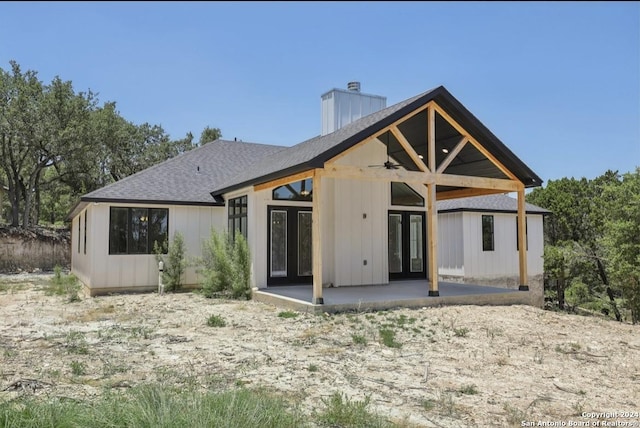 back of house with a patio