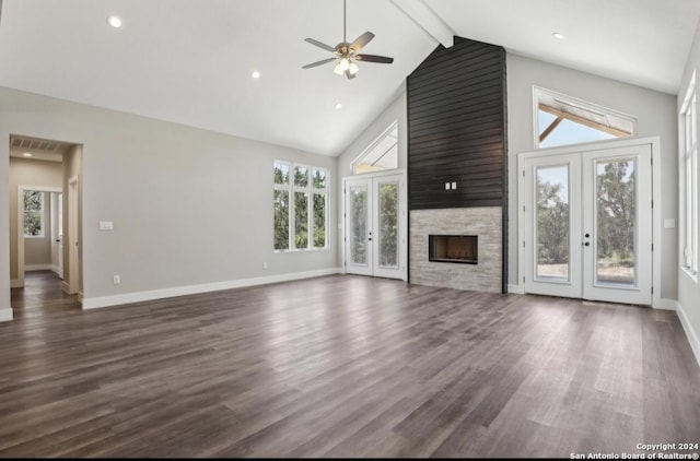 unfurnished living room with french doors, ceiling fan, high vaulted ceiling, beamed ceiling, and dark hardwood / wood-style floors