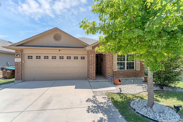 ranch-style house featuring a garage