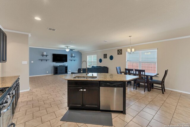 kitchen featuring a kitchen island with sink, hanging light fixtures, sink, ornamental molding, and appliances with stainless steel finishes