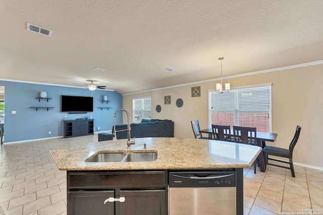 kitchen with sink, stainless steel dishwasher, pendant lighting, a kitchen island with sink, and ceiling fan with notable chandelier