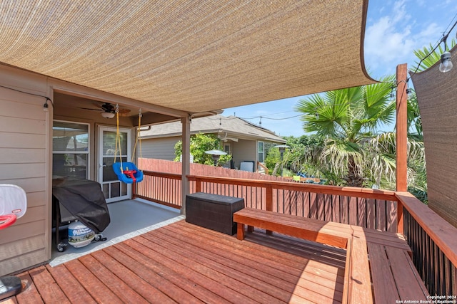 wooden terrace with ceiling fan