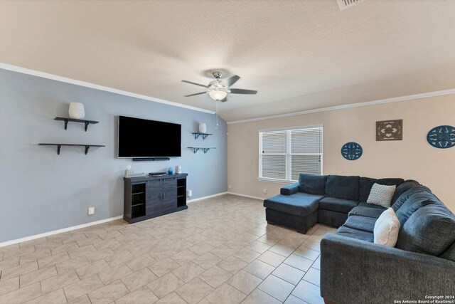 living room featuring a textured ceiling, ceiling fan, and ornamental molding