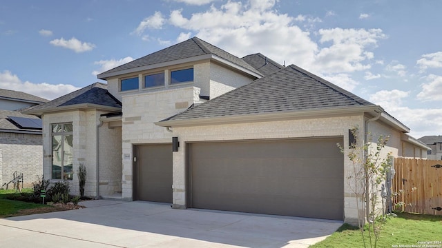 view of front of property featuring a garage