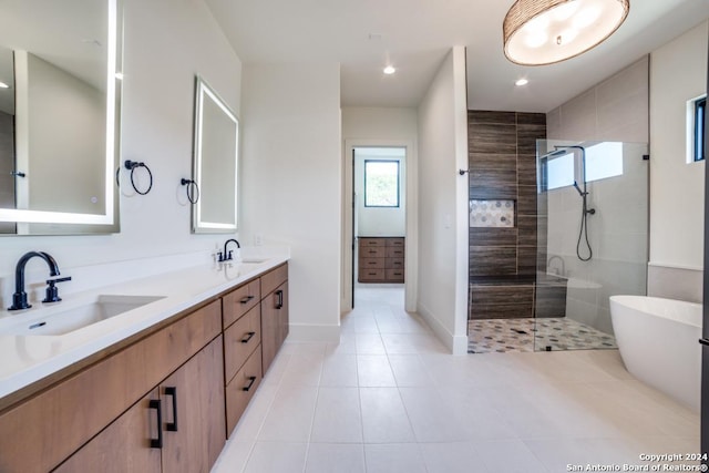 bathroom with vanity, separate shower and tub, and tile patterned floors