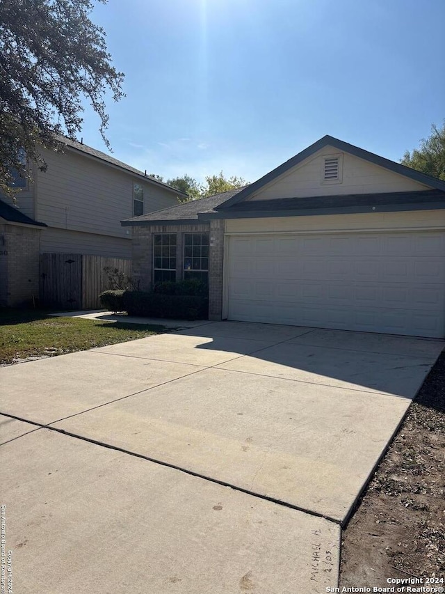 exterior space with a garage