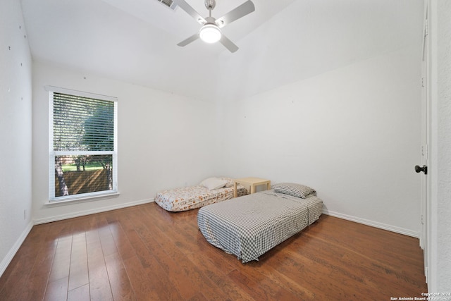 bedroom featuring ceiling fan and wood-type flooring