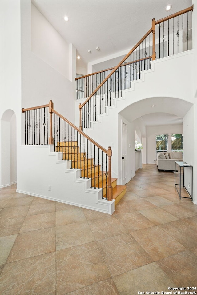 stairs with a high ceiling