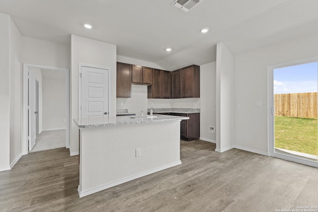 spare room featuring hardwood / wood-style floors