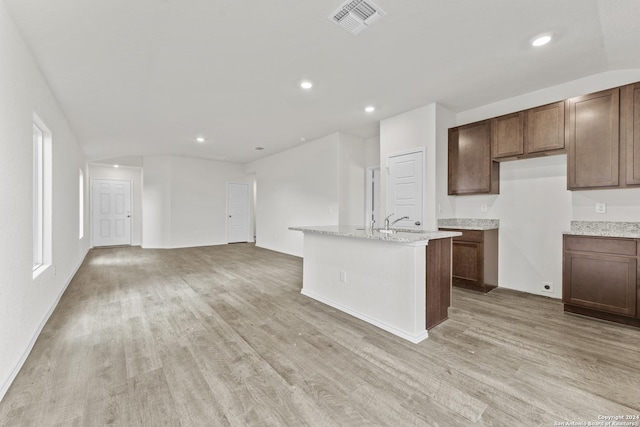 spare room with wood-type flooring