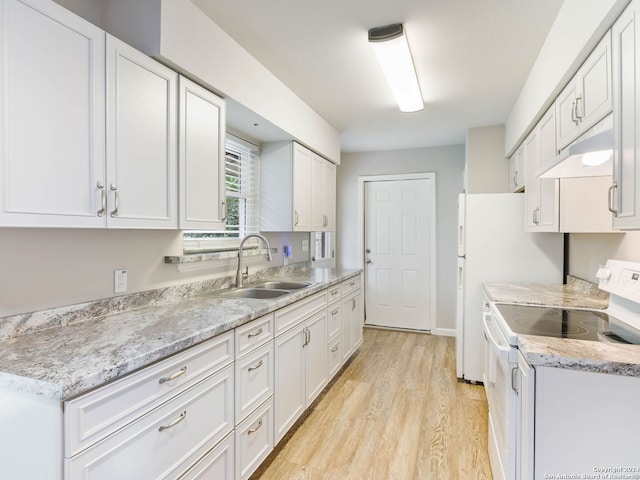 kitchen featuring electric stove, light wood-style flooring, white cabinets, a sink, and light stone countertops