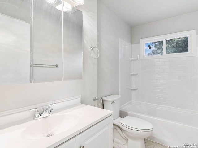 full bathroom with toilet, vanity, and tub / shower combination