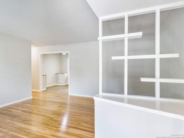 empty room with wood-type flooring